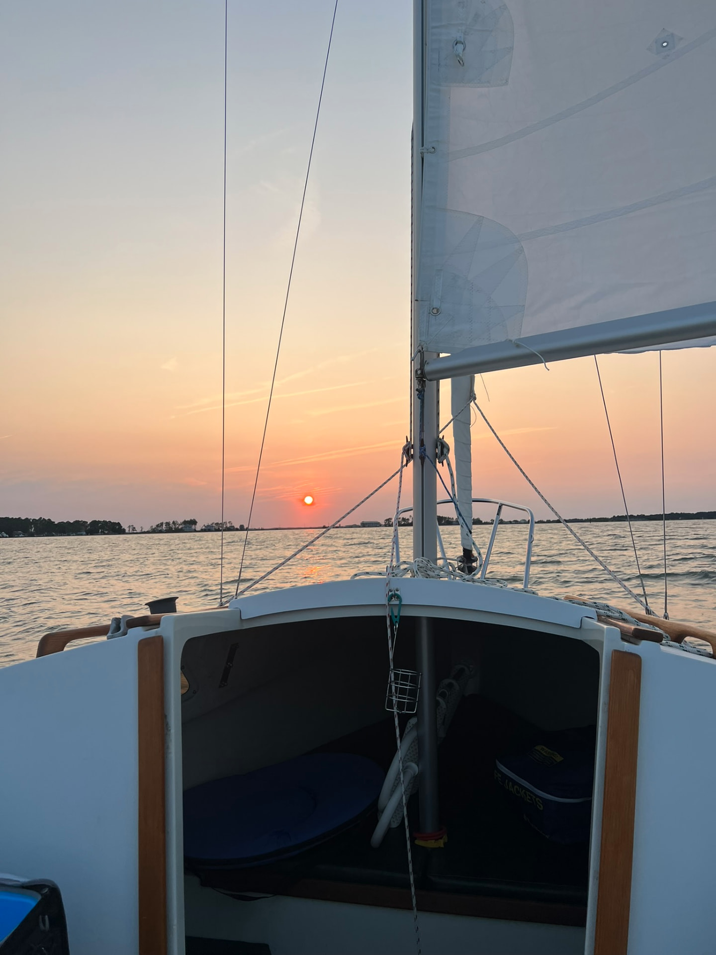 Sailing Spoonful at sunset with the genoa drawing