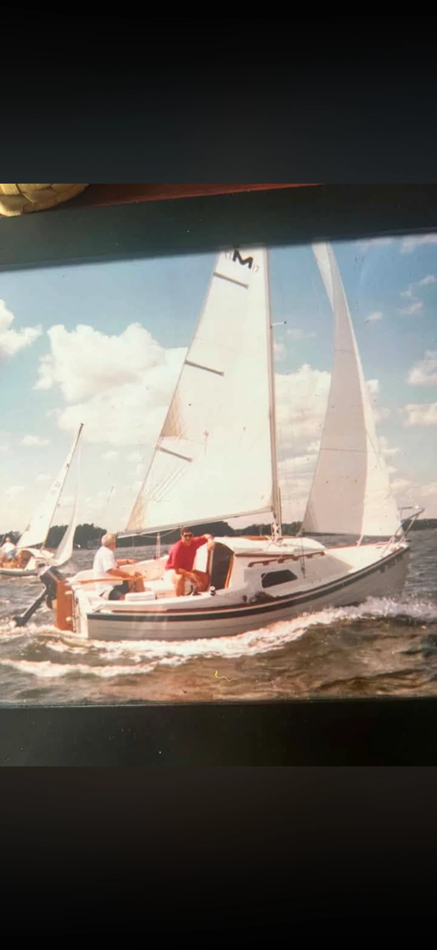 Greg and his buddy sailing Spoonful on the Patuxent River in 1995