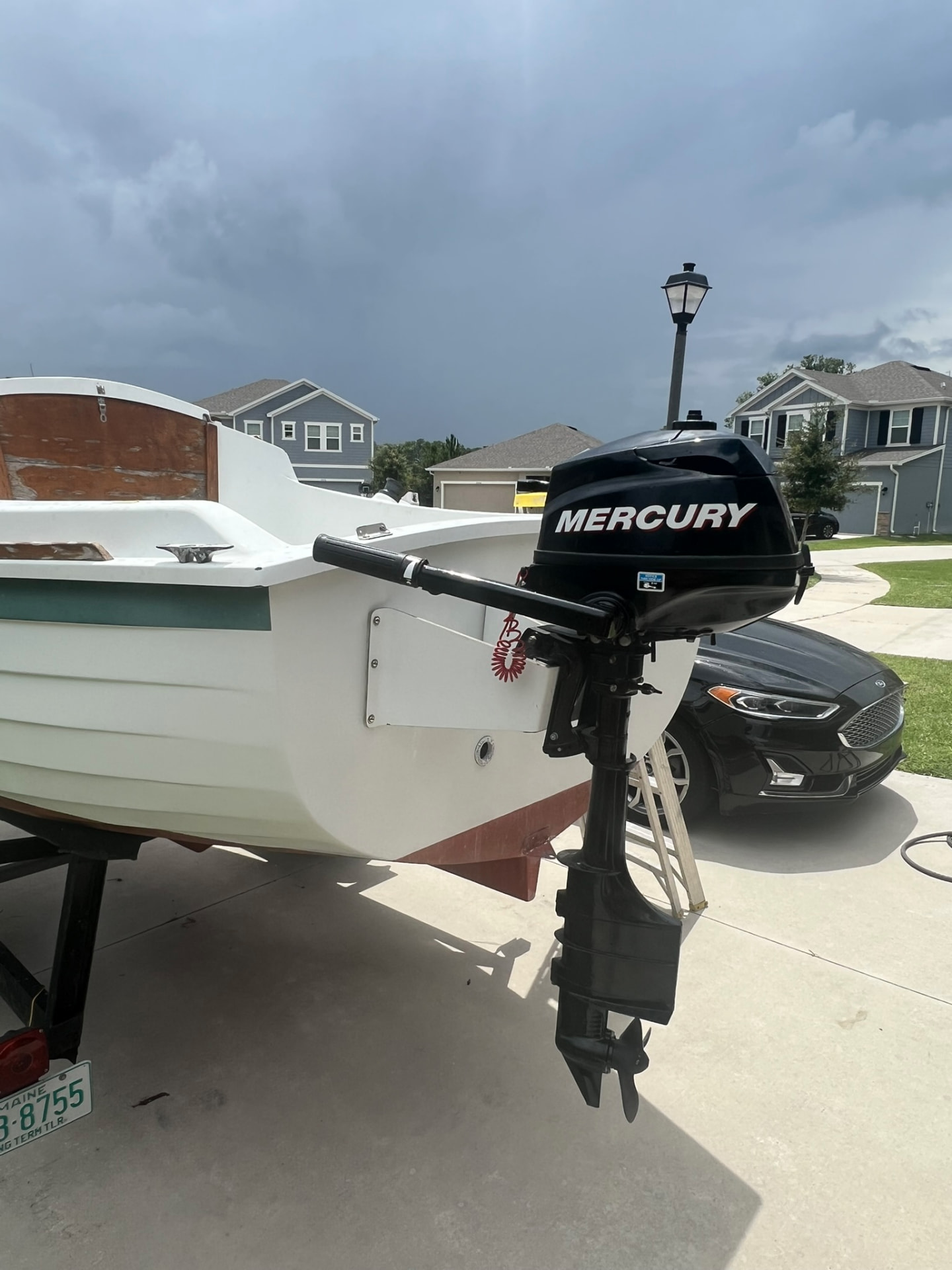 Mercury outboard on the transom bracket, stern quarter view