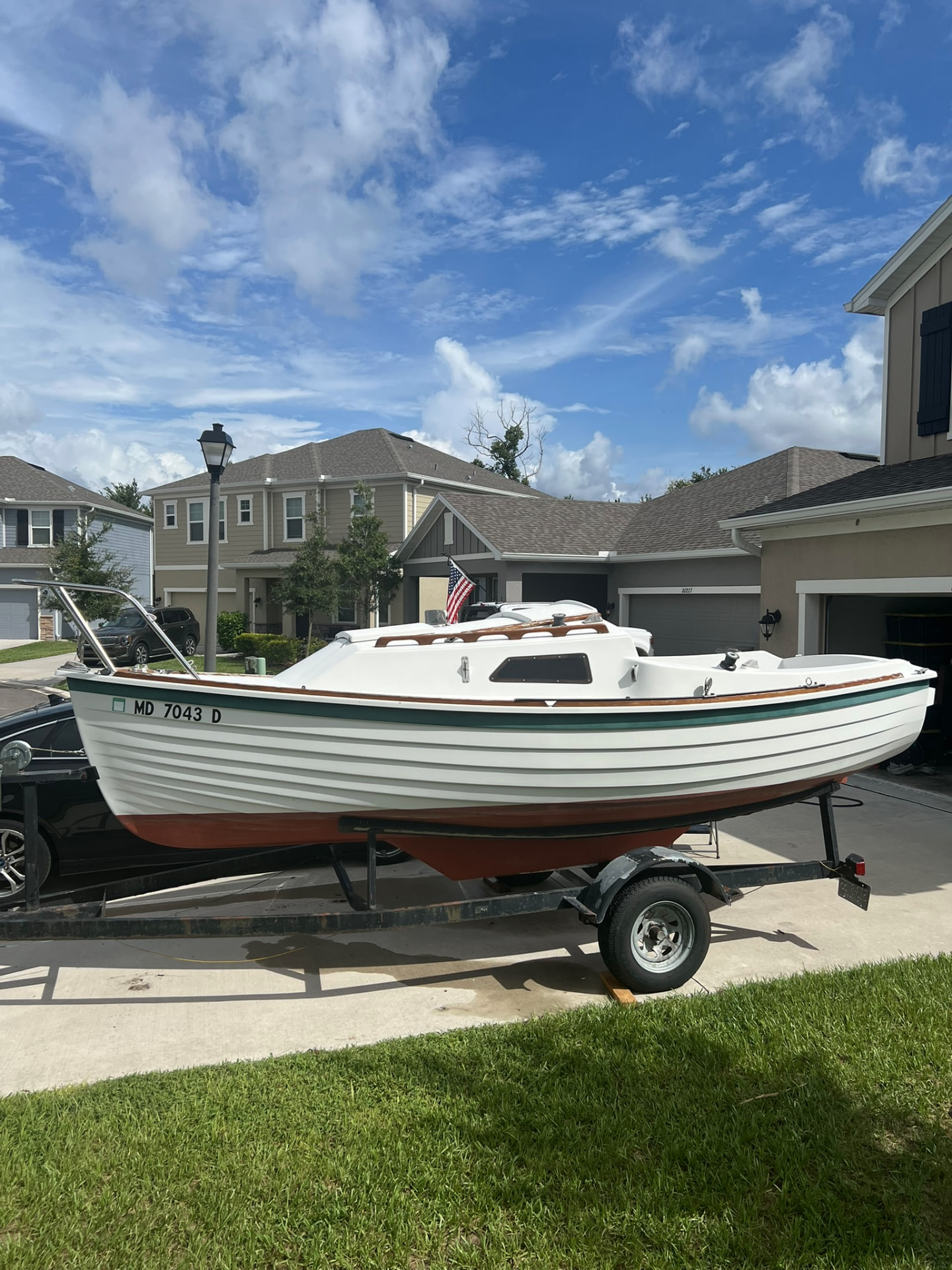 Spoonful on her trailer, starboard side view with cockpit visible